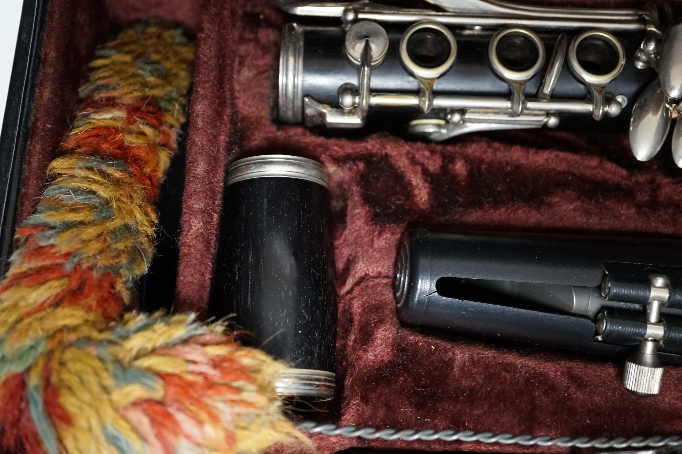 A cased Boosey & Hawkes 4-20 clarinet, in a fine original fitted leather case